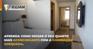 quatro bem iluminado, mostrando uma cama, criado-mudo, tv e abajur