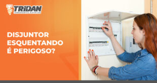 à direita uma pessoa colocando a mão em um disjuntor, á direita o seguinte texto: Disjuntor esquentando é perigoso?